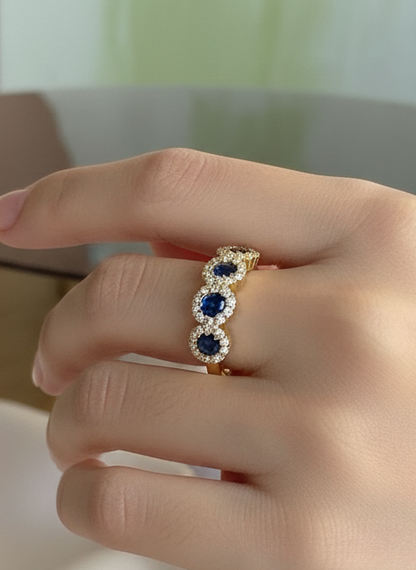 Anello veretta a fior di luce in argento 925 con pietre centrali blu