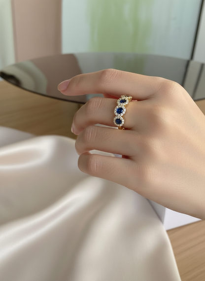 Anello veretta a fior di luce in argento 925 con pietre centrali blu